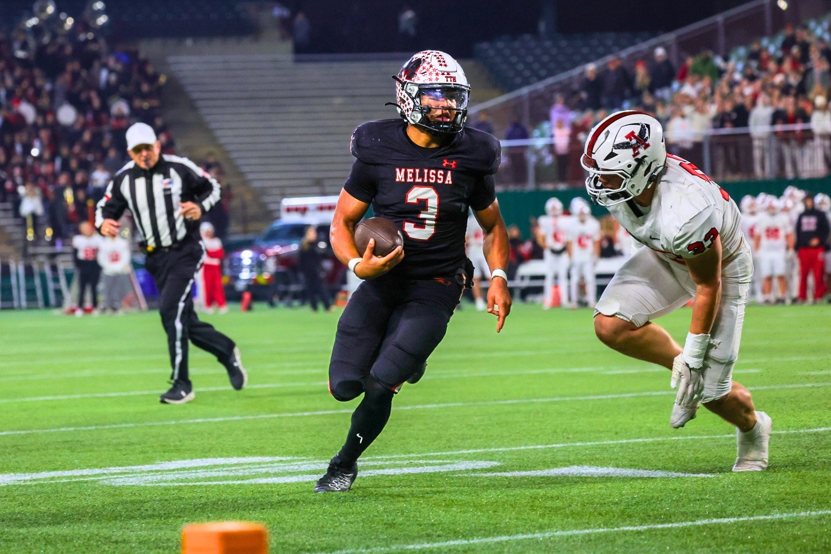 football player runs the field