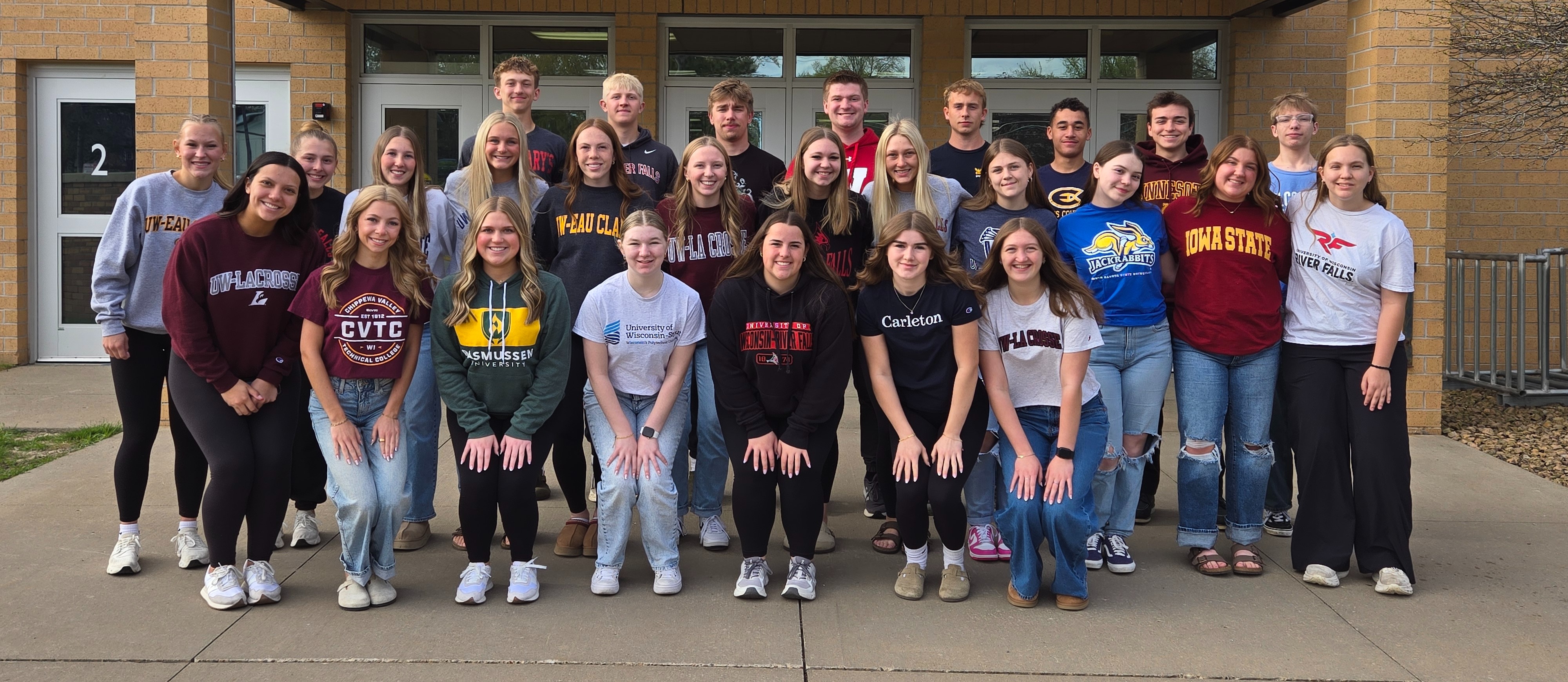 National Decision Day picutre of high school student in shirt with what college they are going to in the future.