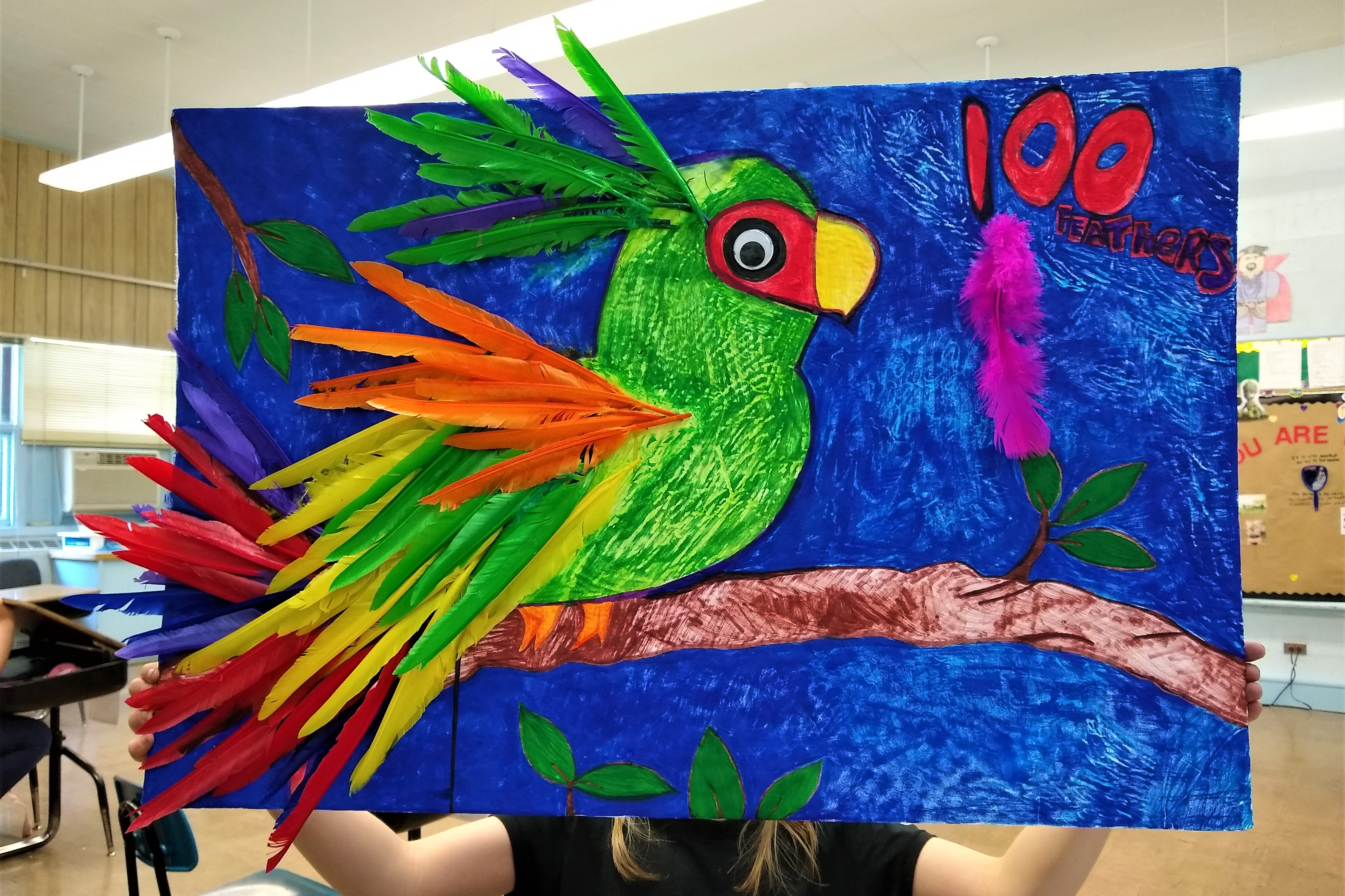 A student created this beautiful art piece with 100 feathers.
