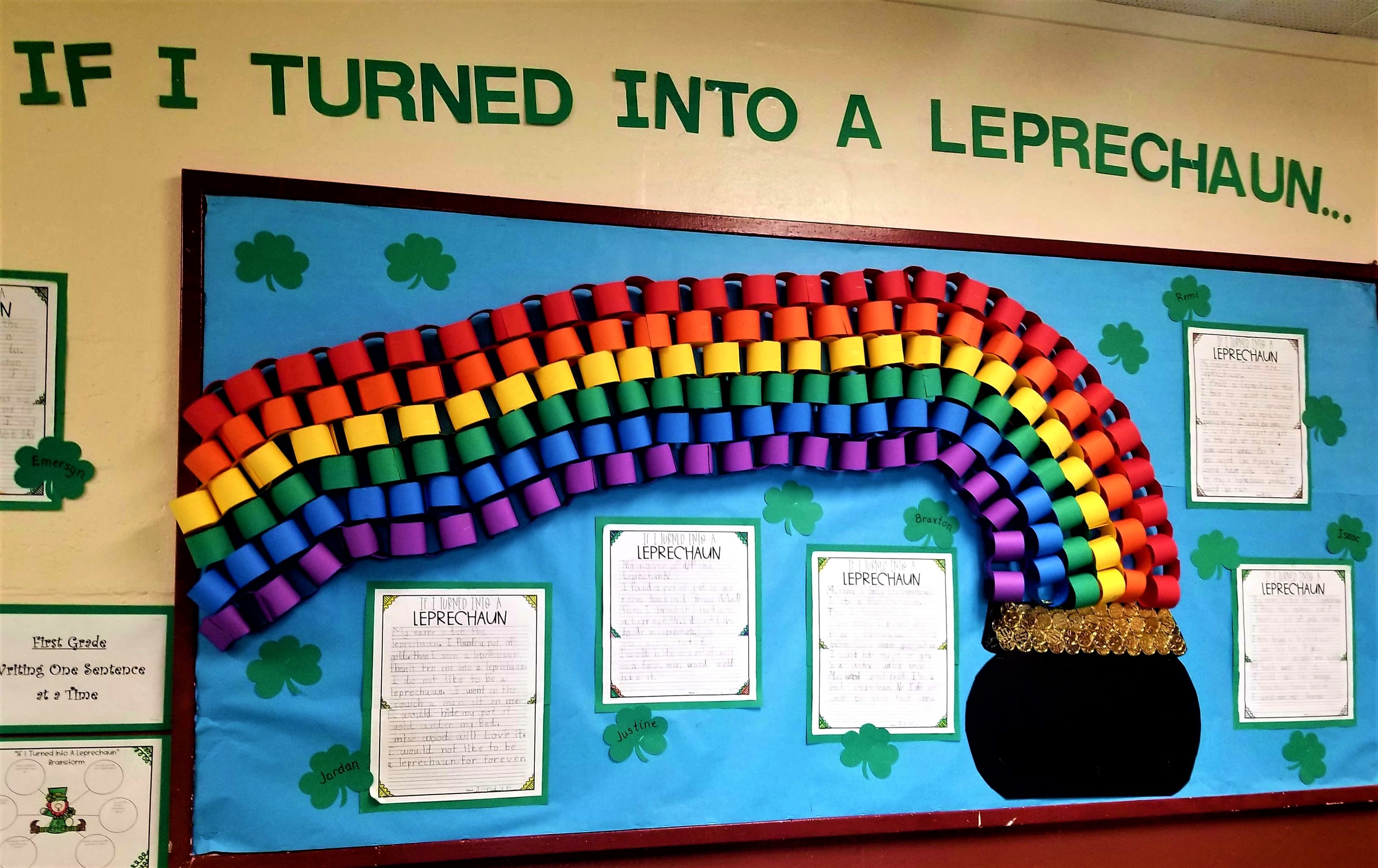 February board that you see at RES as you enter the school decorated with craft rainbow and pot of gold.