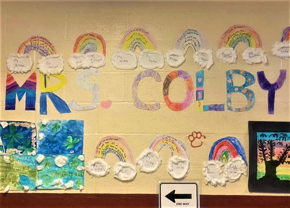 Mrs. Colby's class recognizes her new name with lettered artwork.