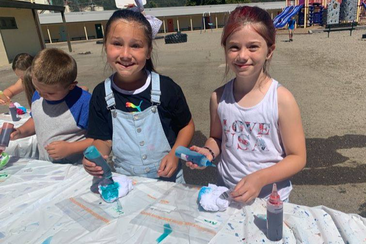Campers make some tie dye creations!