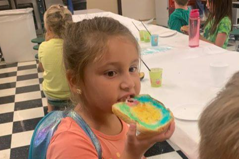 Fun in the cafeteria at New Ventures Camp! Bread painting and eating?!