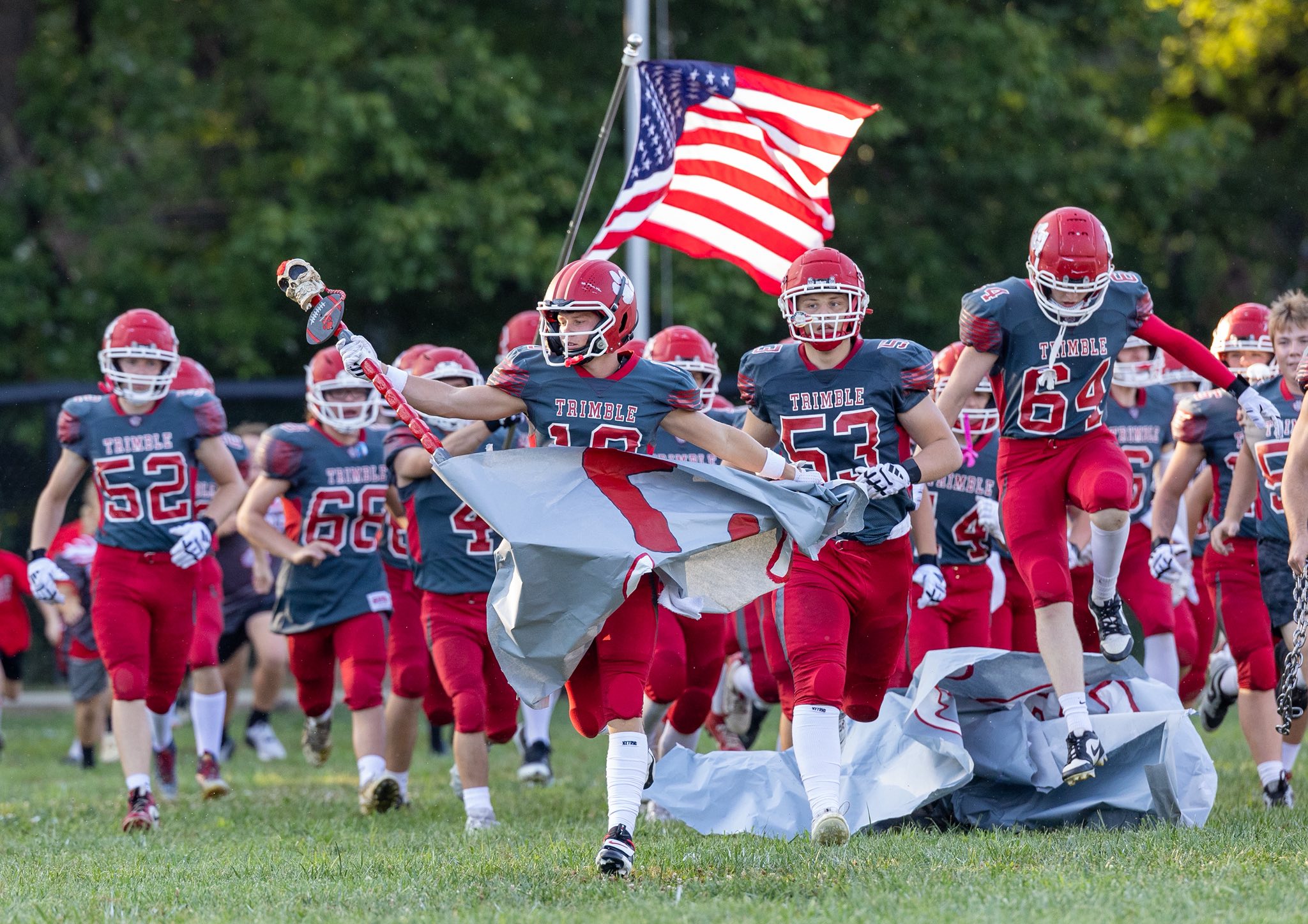 Football team running onto the field