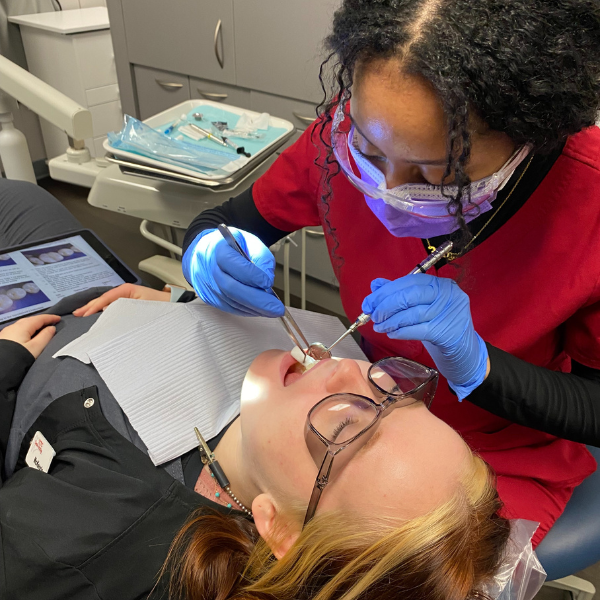 Dental seniors applying  sealants