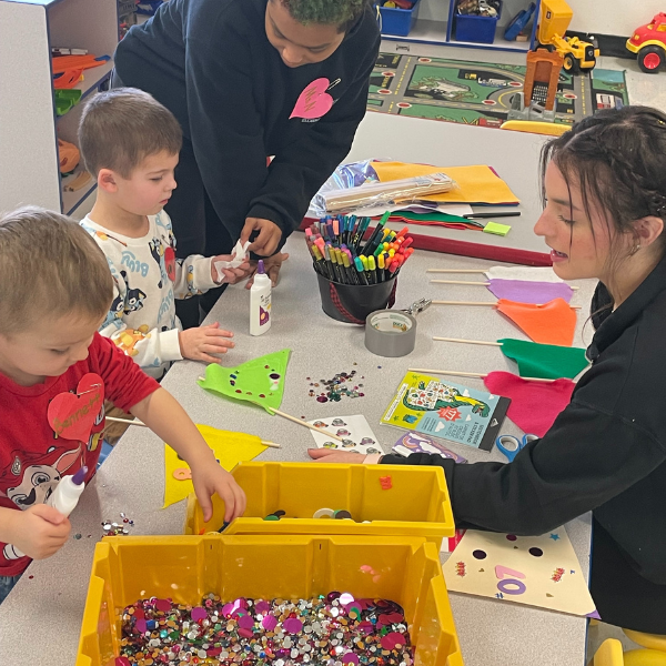 Helping preschoolers make sports pennants