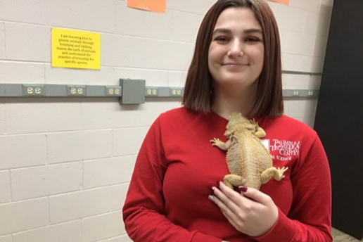 Student with Reptile