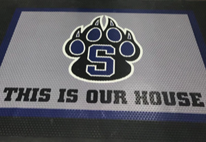 text: this is our house. with logo