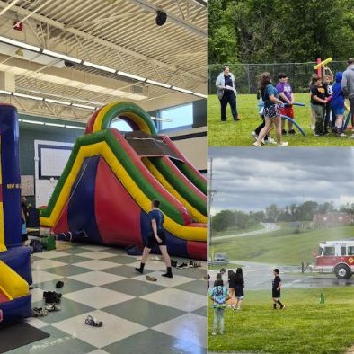 Students enjoy Field Day activities, including inflatable obstacle courses, outdoor team games, and a visit from local firefighters who cool participants with a water spray demonstration.