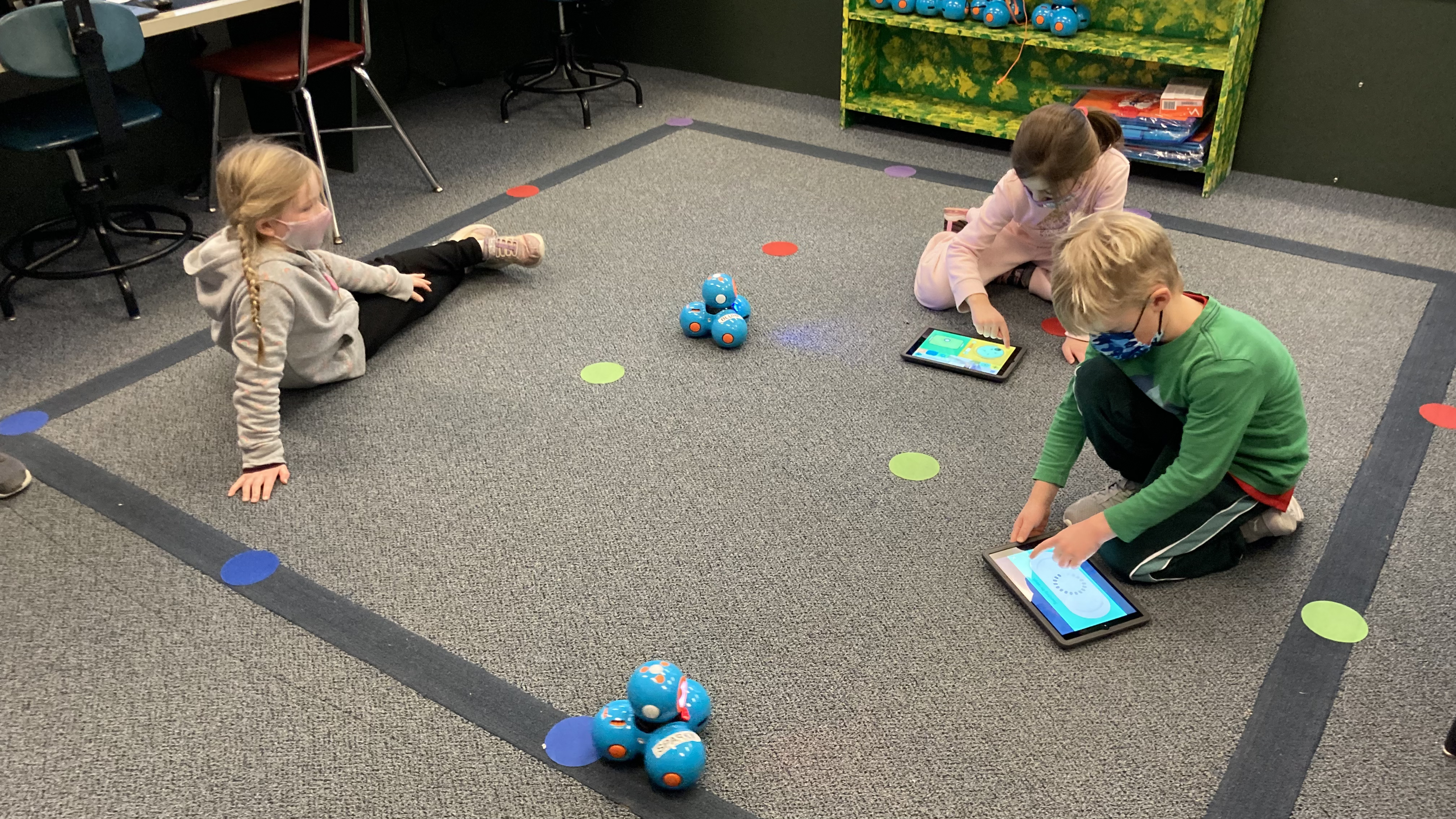 Students Playing with Robots