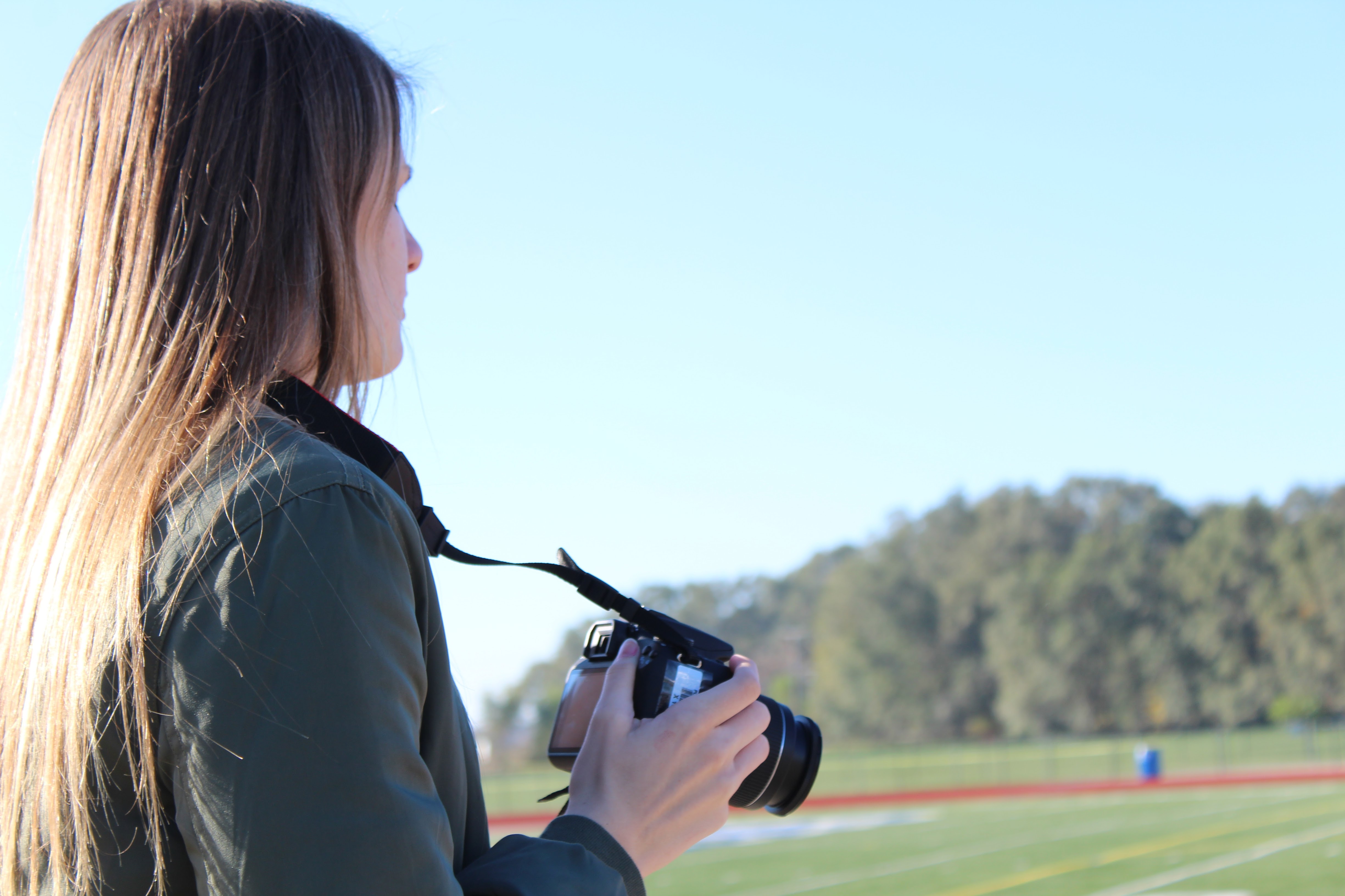 Picture of student holding a camera 