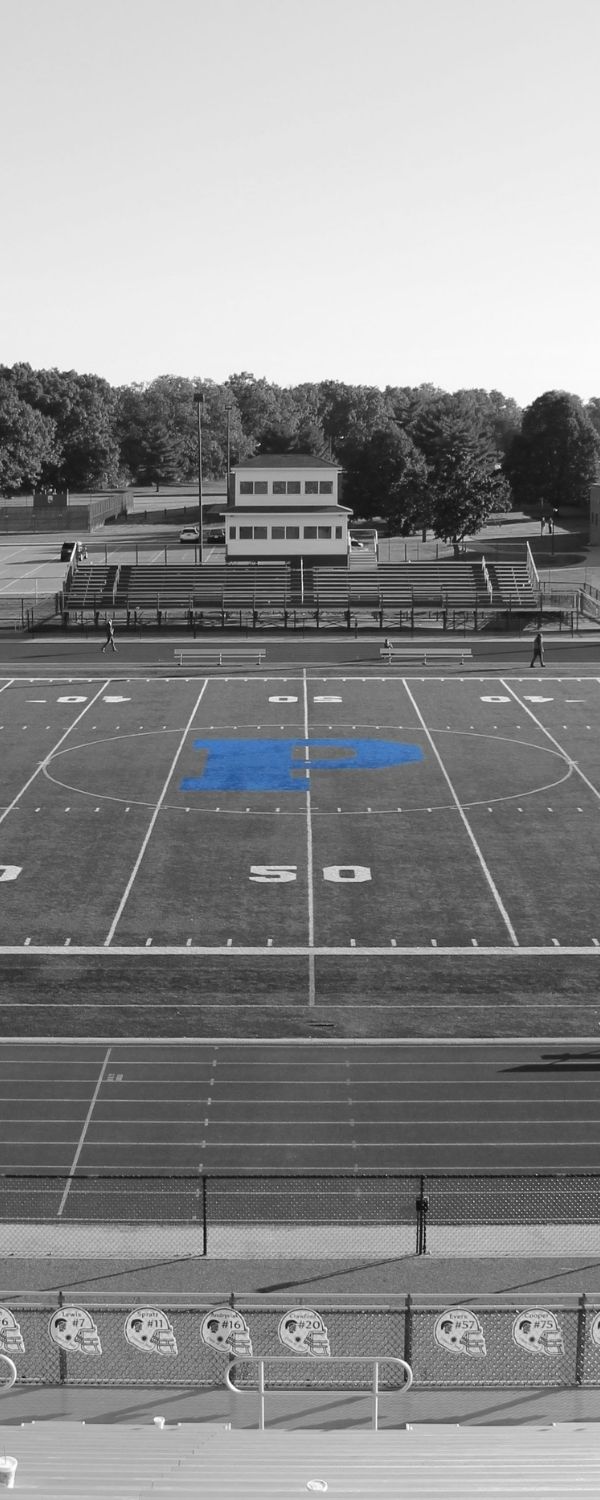 Black and white picture of football field with P highlighted in blue