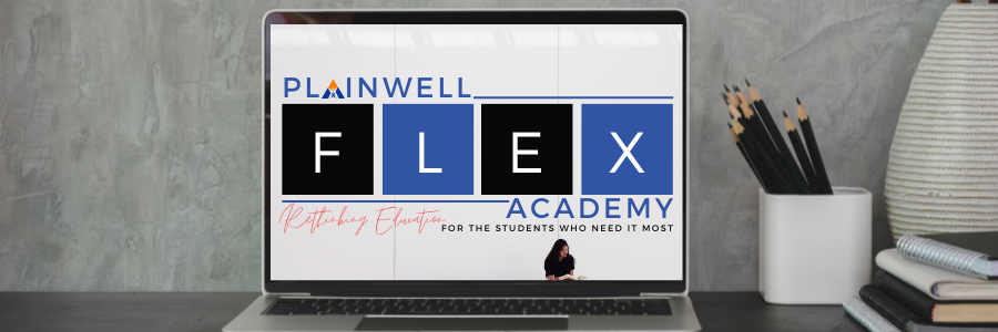 FLEX Academy Logo on computer screen on desk
