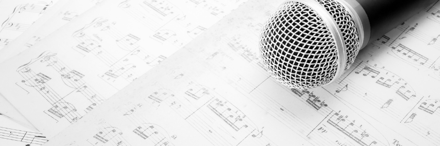 Picture of sheet music with microphone