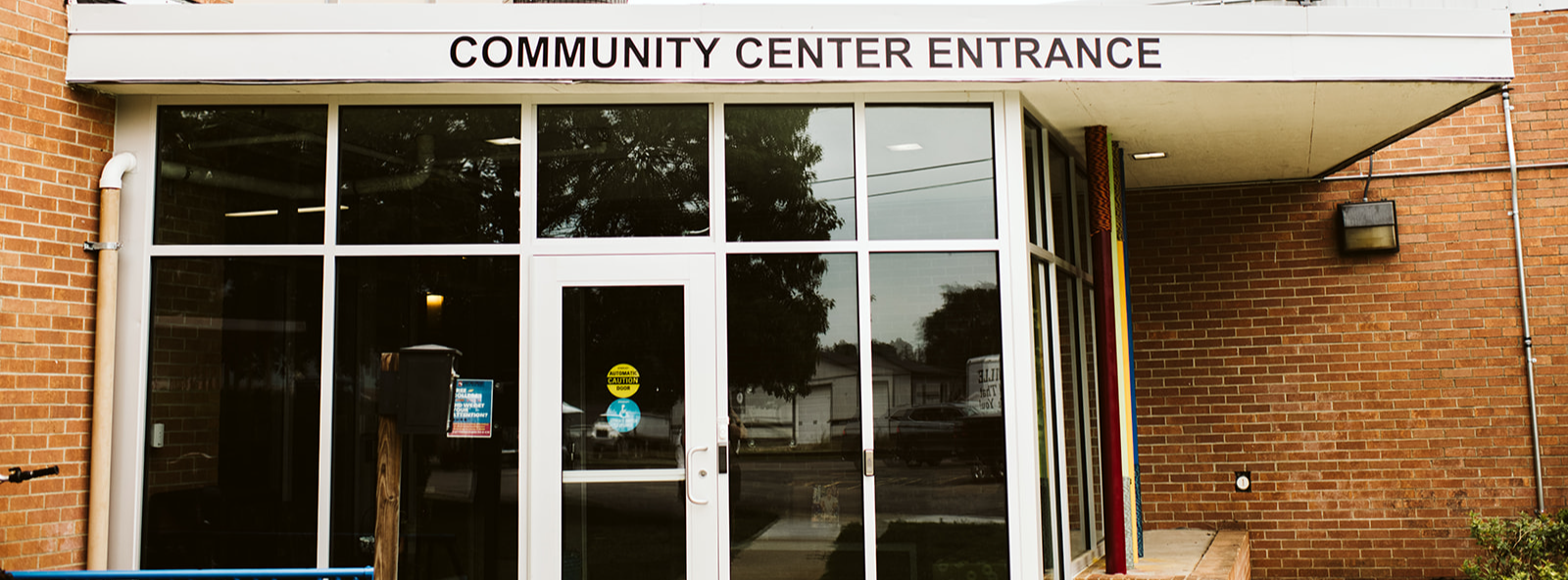 Front entrance to Community Center (front doors and glass windows)