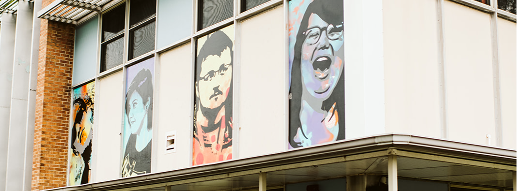 Picture of exterior building - painted pictures of students 