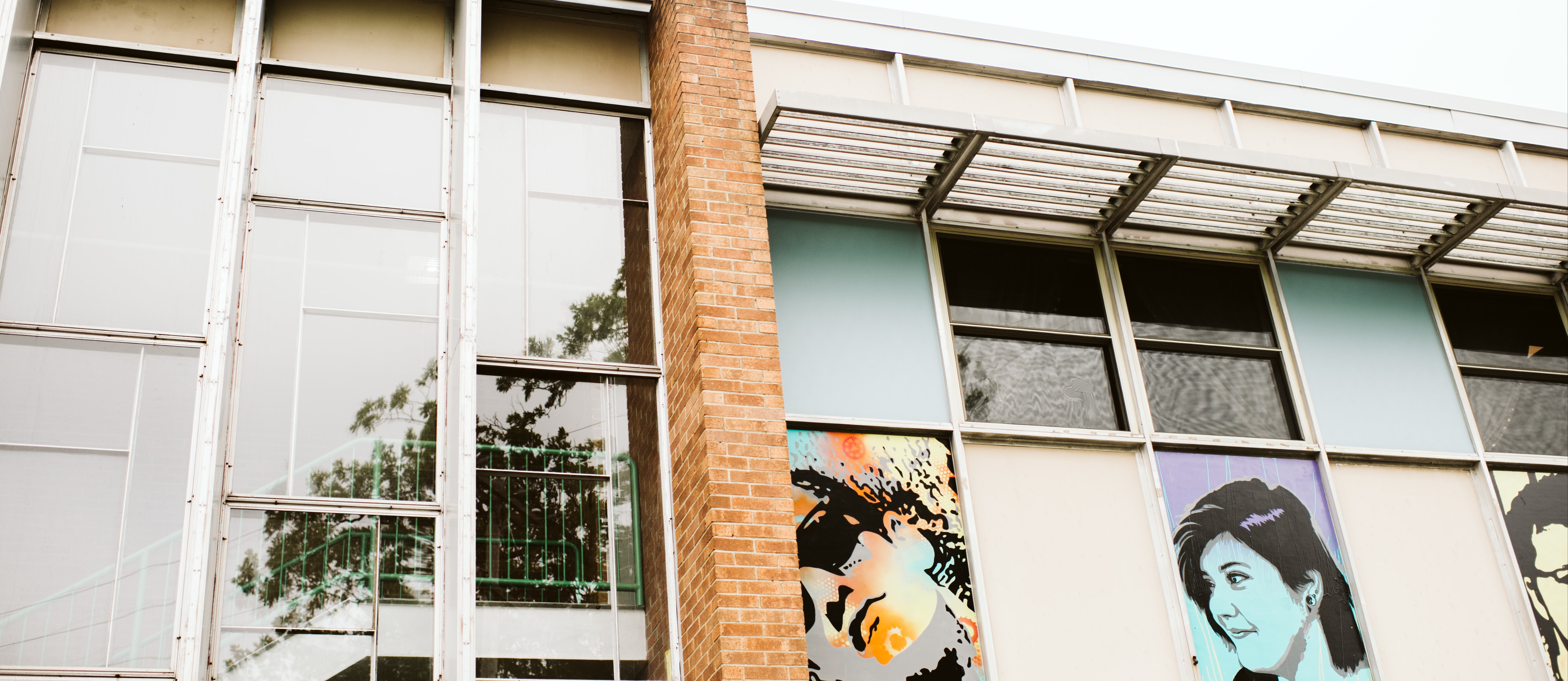 Picture of exterior building - painted pictures of students 