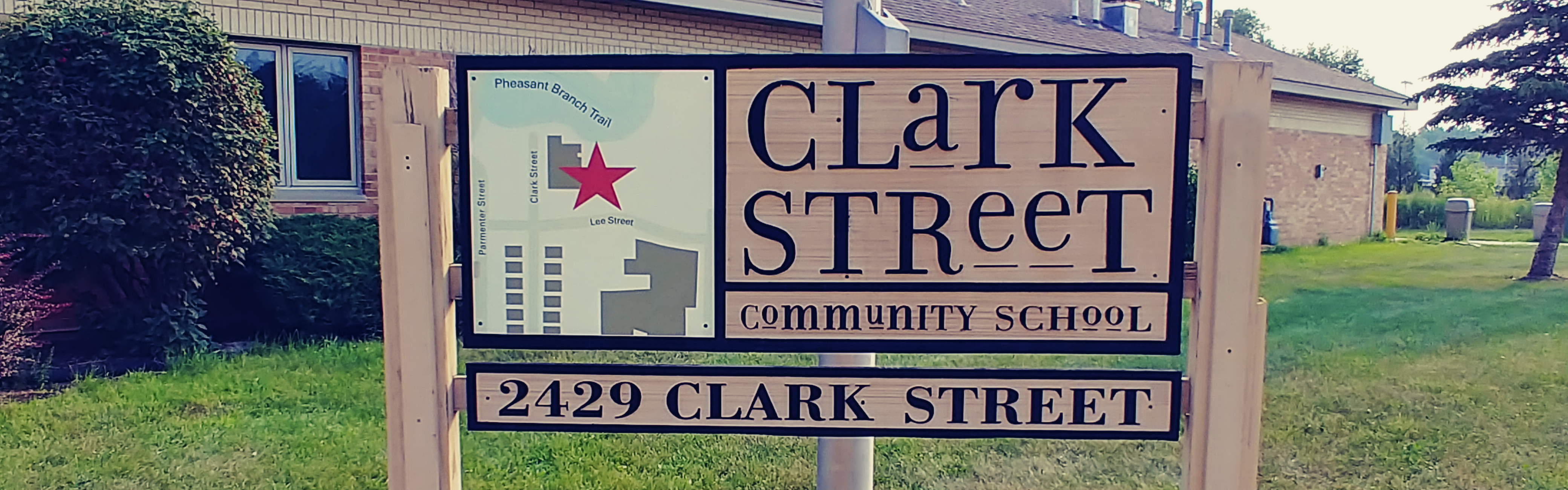 Clark Street Community School sign in front of the school