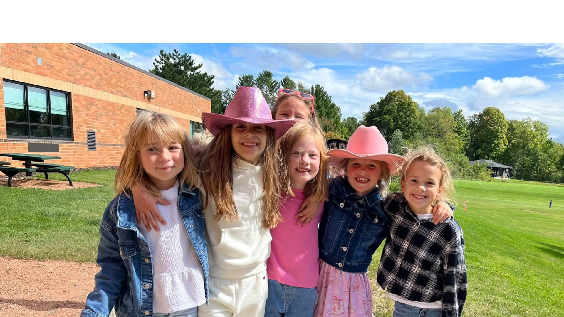 Students outside at recess for a photo.