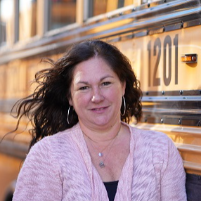 Cynthia Crper, Headshot in front of a bus