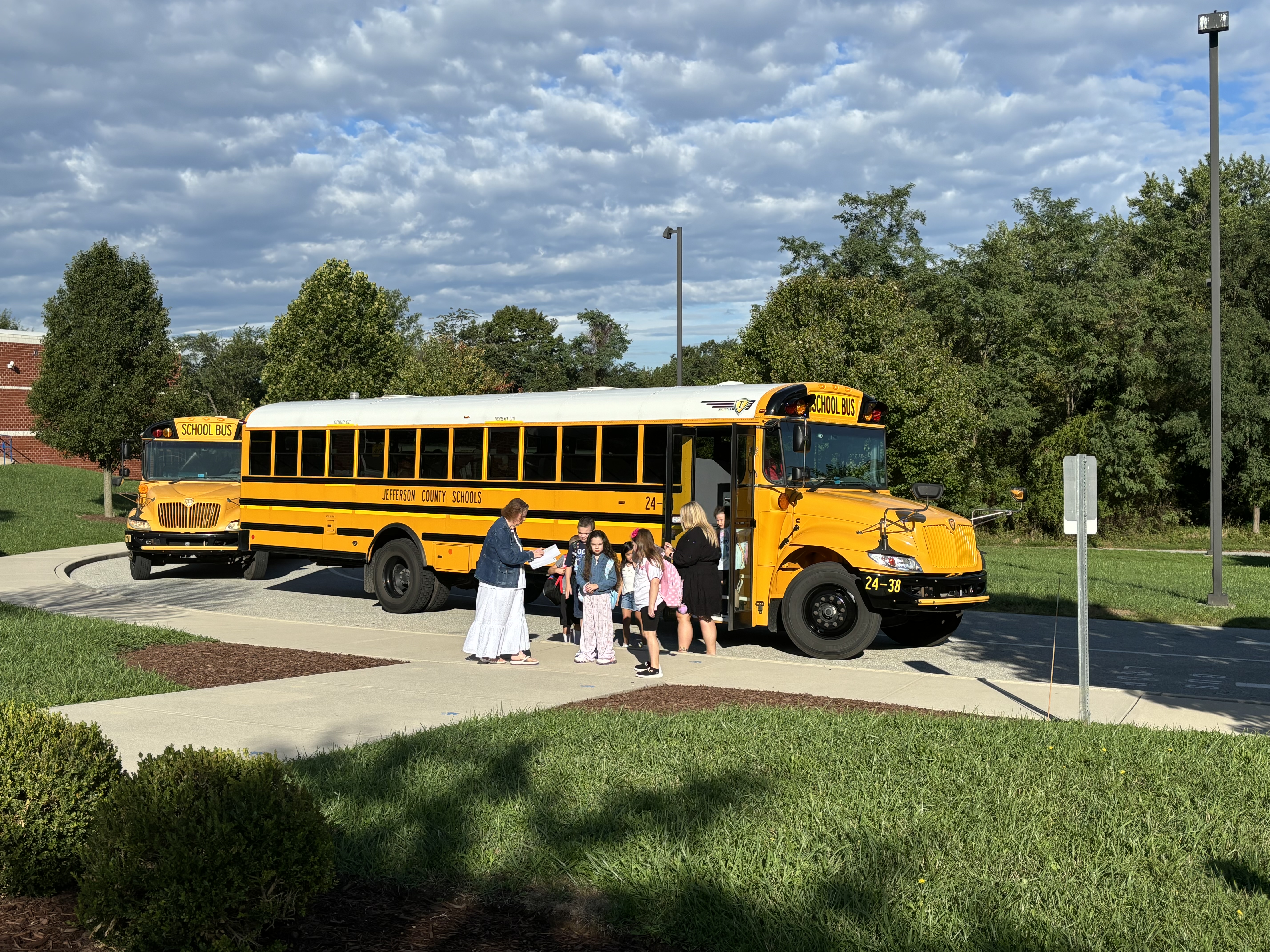 Students leaving a school bus