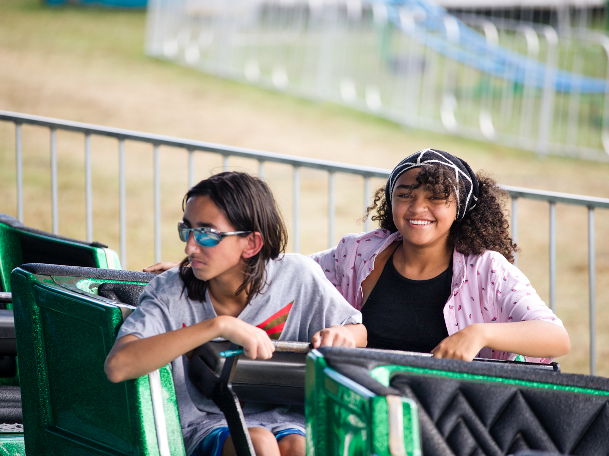 2 students on a carnival ride