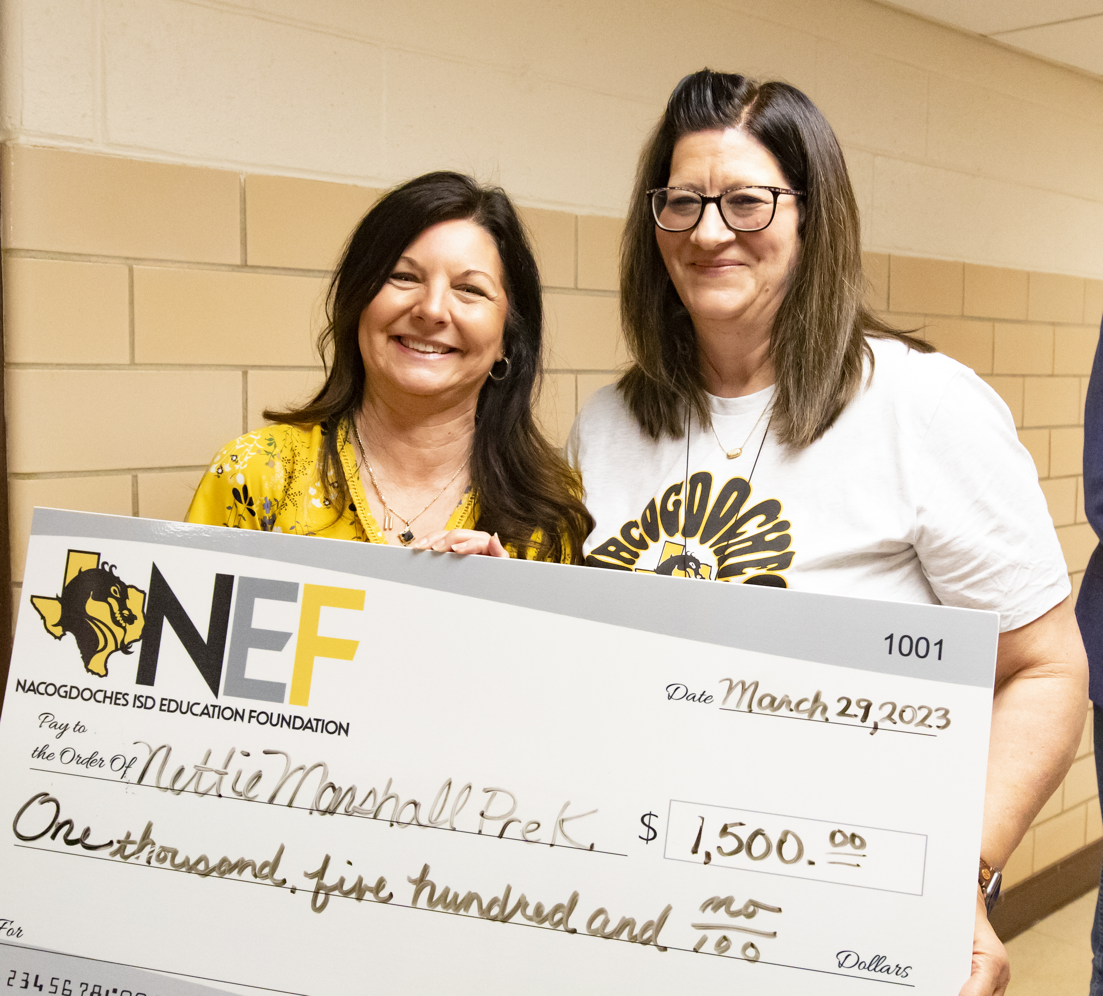 Nacogdoches ISD Education Foundation Executive Director Erin Windham (left) shown with Angela Edge