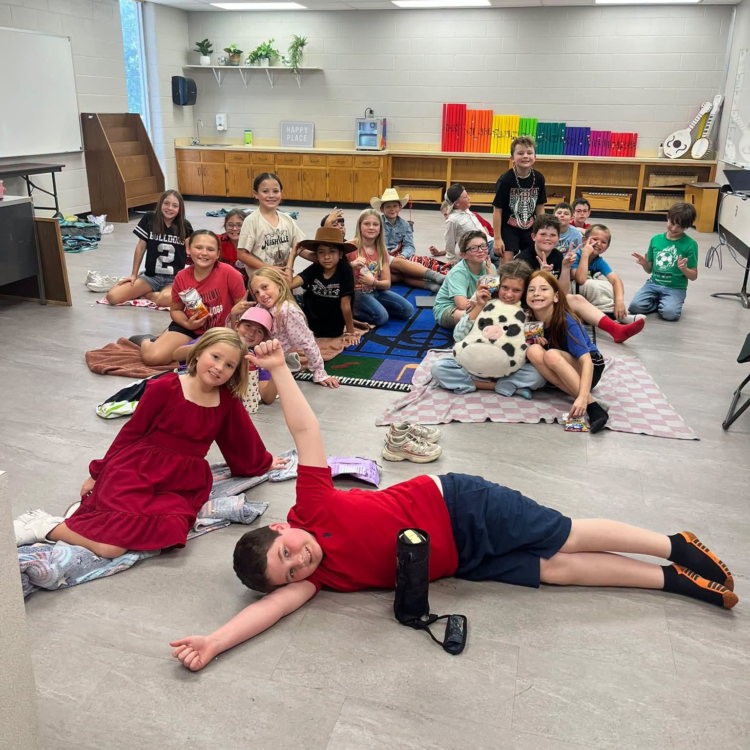 Mrs. Salley officially kicked off The Next Chapter Society today, welcoming 27 founding fourth-grade members to its inaugural meeting. To earn a spot in the weekly book club, students must meet their IXL goals, giving them the chance to relax with a snack, discuss stories, and complete fun activities. The group launched their reading journey with Peter Brown's The Wild Robot, and we look forward to seeing even more hard-working students join the fun next week!