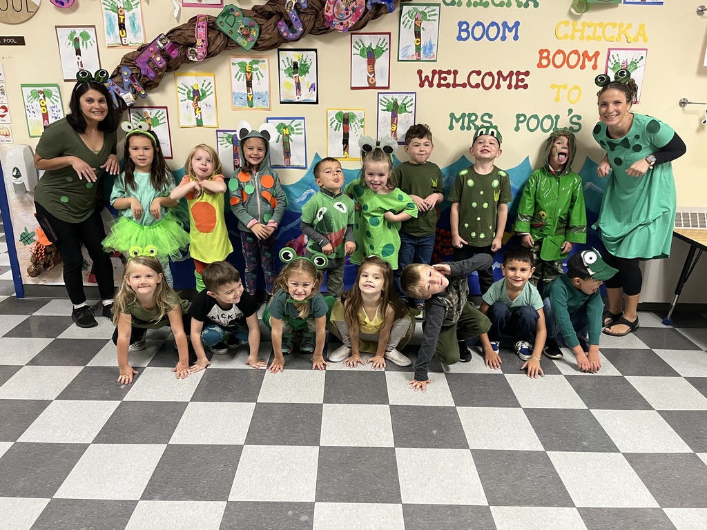 elementary staff and students dressed up as frogs