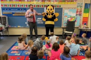 Mr. Binotto and Buzzy having a classroom visit on the first day of school.
