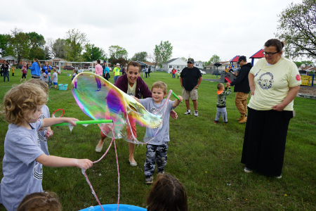 students playing with bubbles