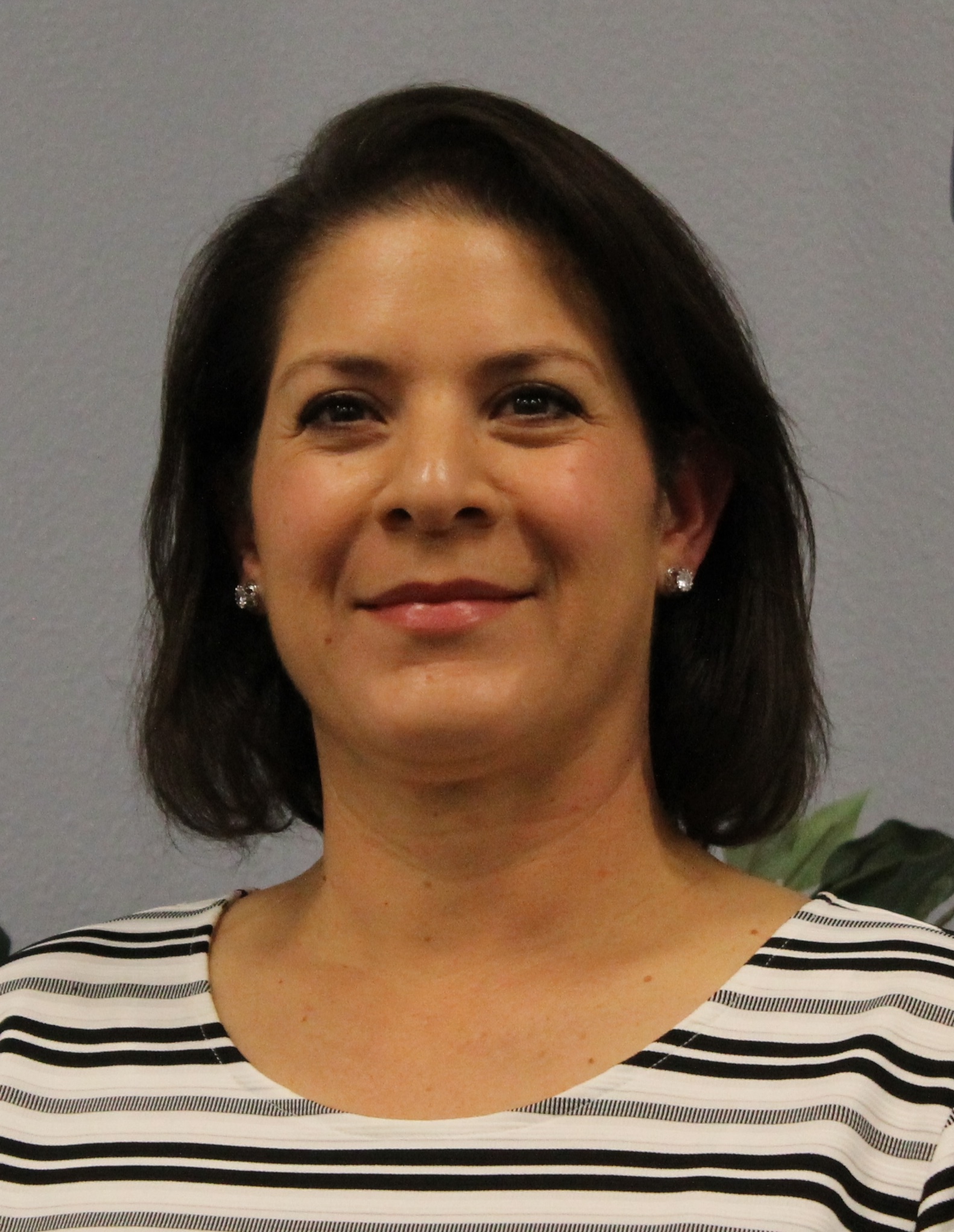 Dr. Claudia Moya-Tanner, President