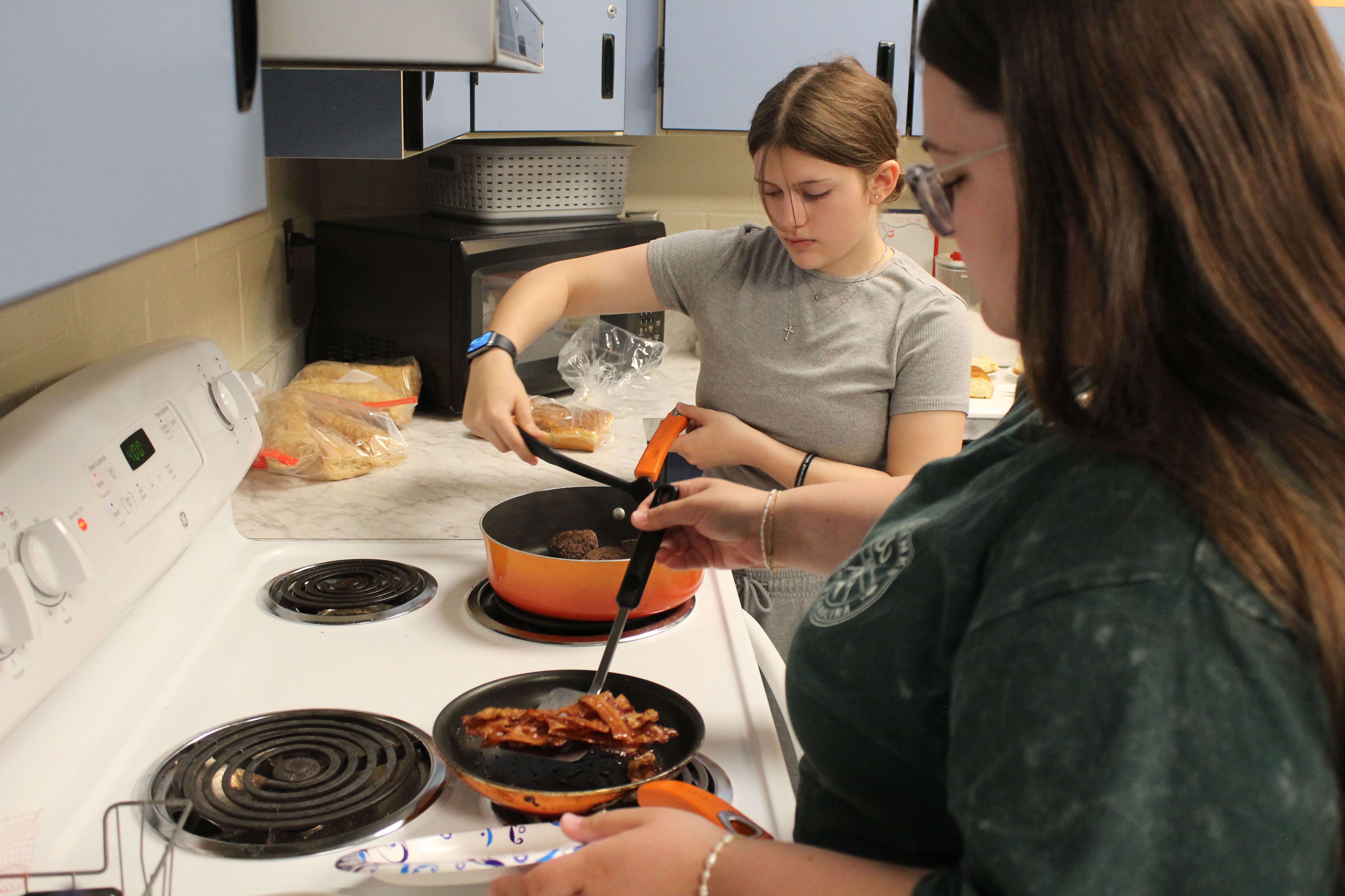 two student cooking