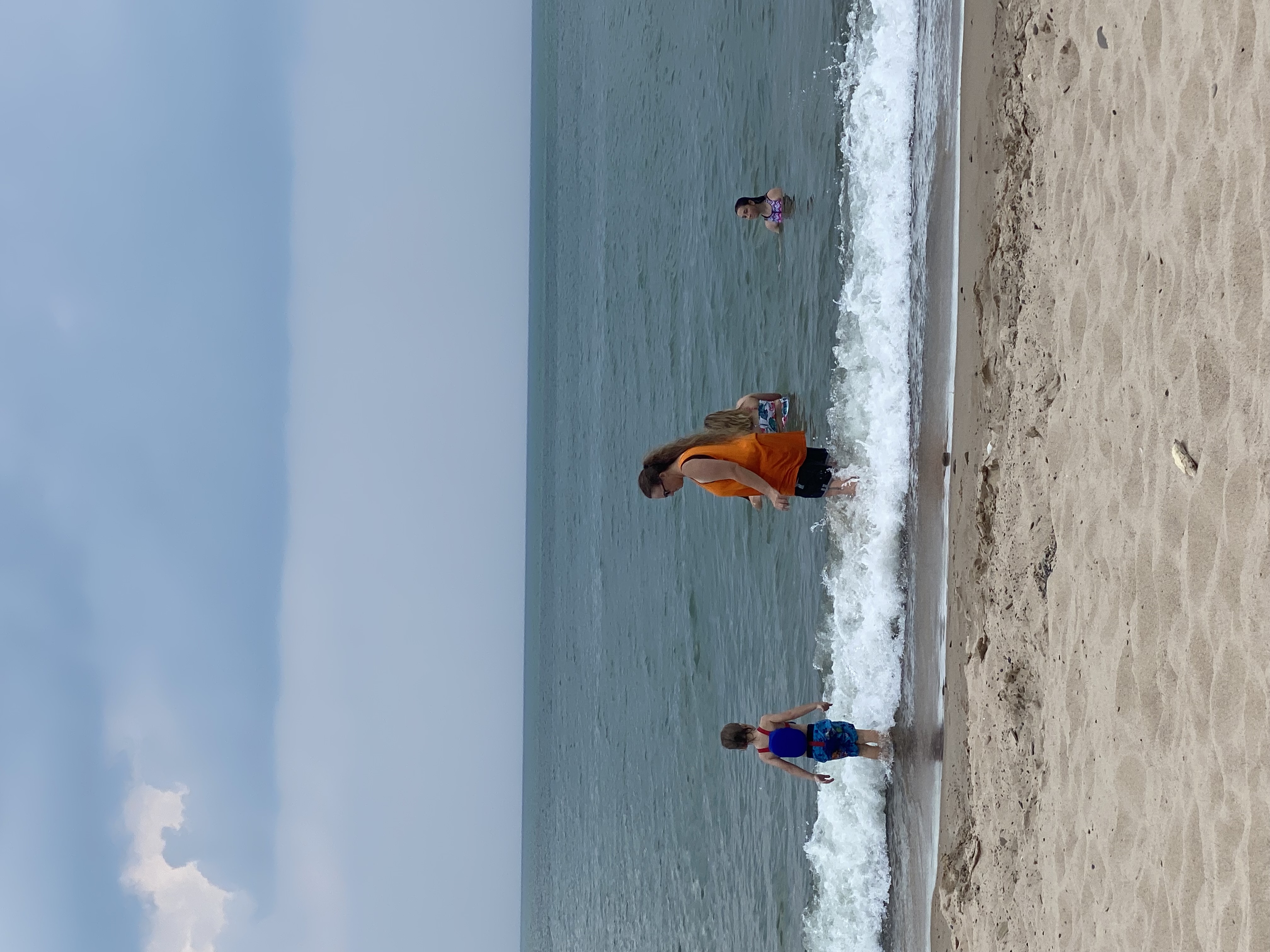 Family swimming in Lake Michigan