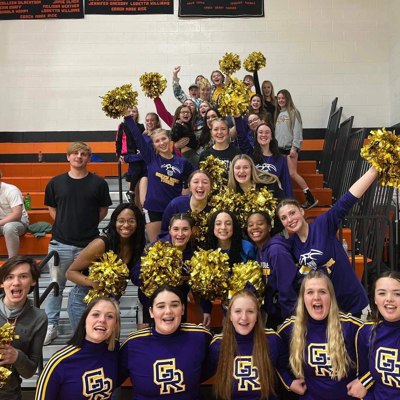 student section cheering at basketball game