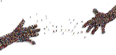 Birds eye view of two groups of people making the shape of two hands