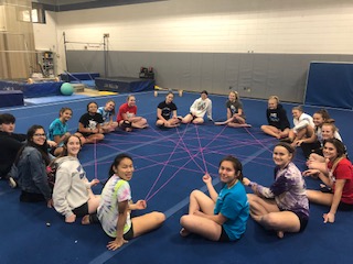 The Gymnastics students training together