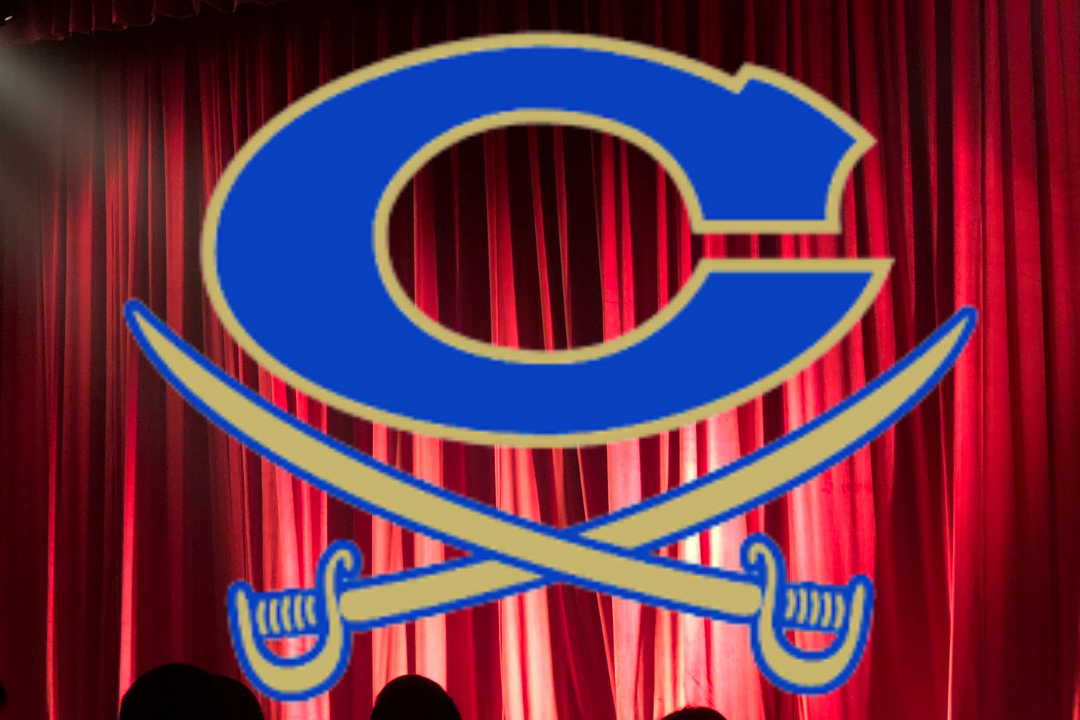 Cass High Logo with photo of stage a red curtain behind it.