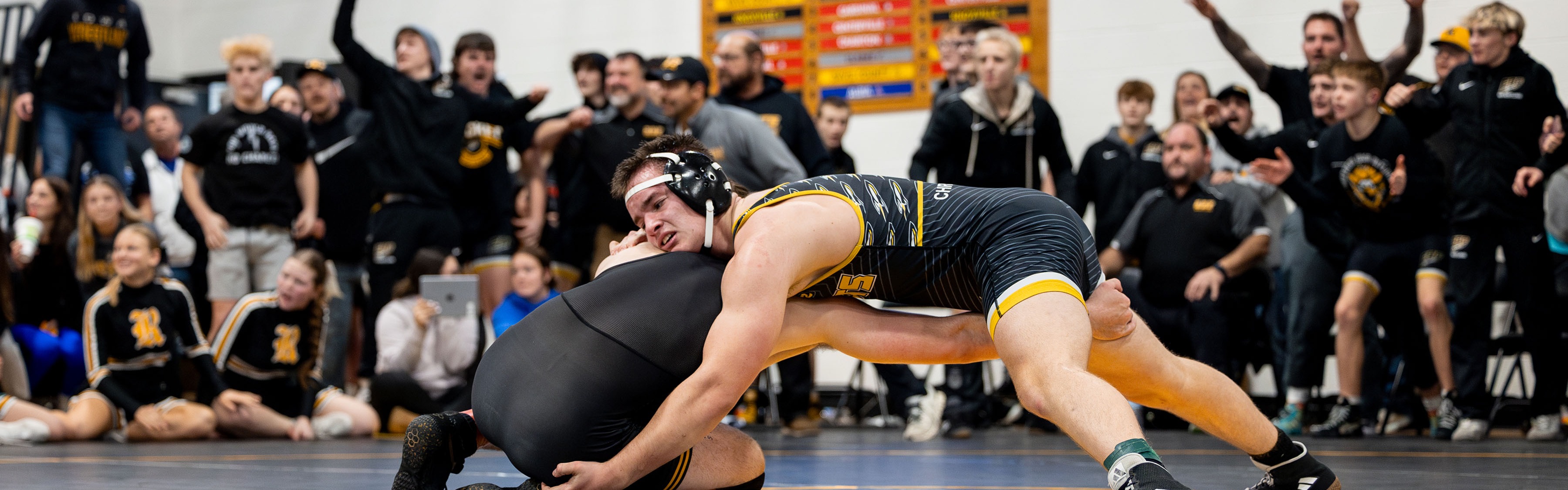 Image of AJ Christner defeating opponent in wrestling match