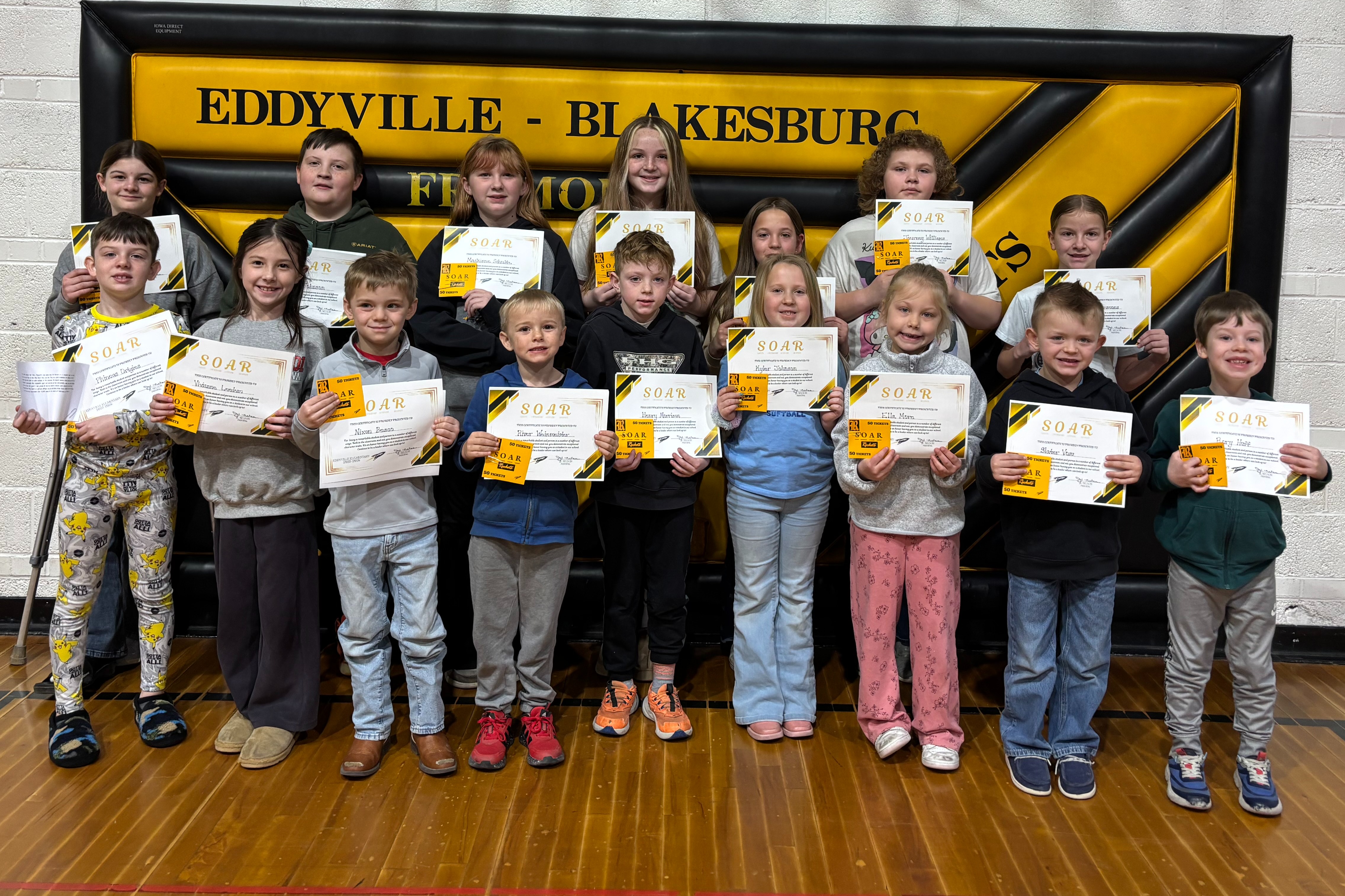 Picture of students from Eddyville Elementary Rockets demonstrating Safety, Ownership, Attitude, and Respect for the month of February
