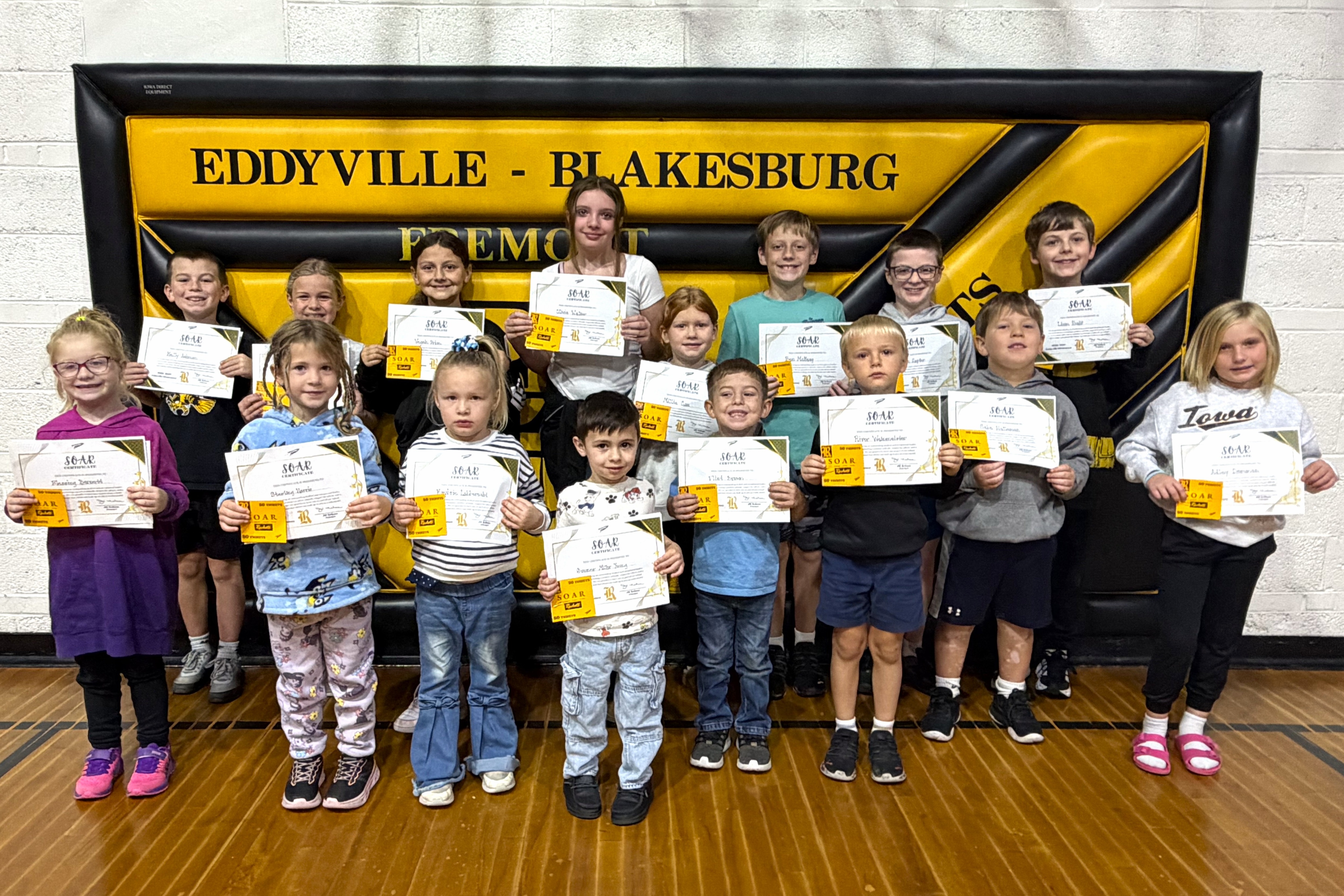 Picture of students from Eddyville Elementary Rockets demonstrating Safety, Ownership, Attitude, and Respect for the month of May