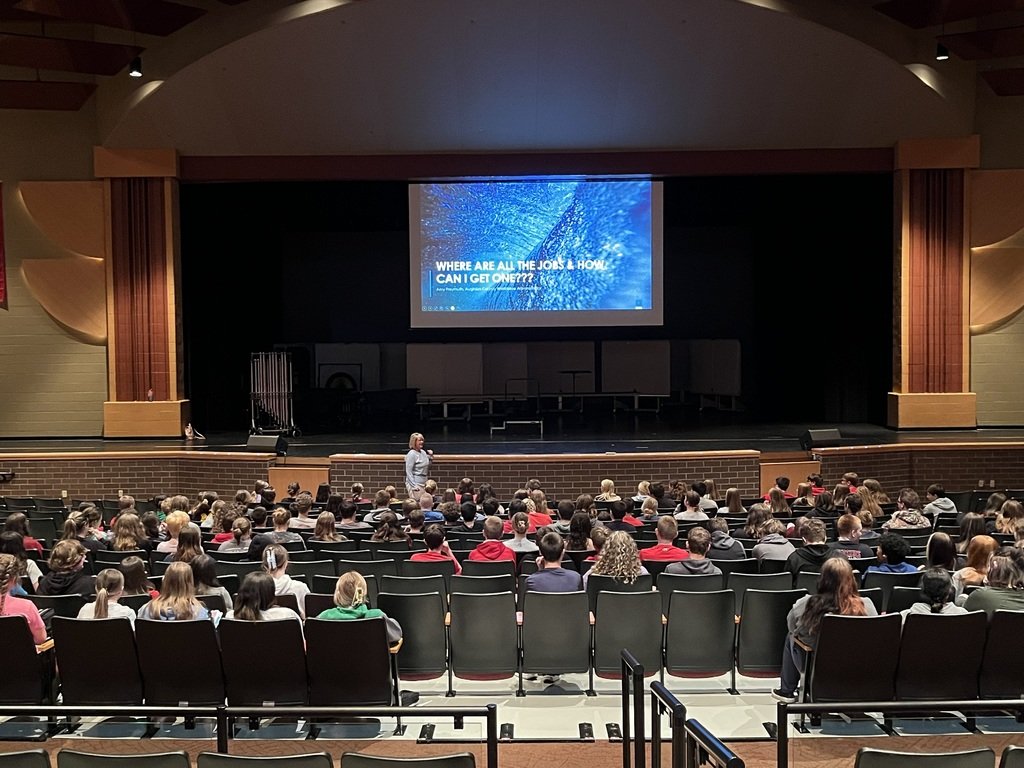 Seating with people viewing a presentation