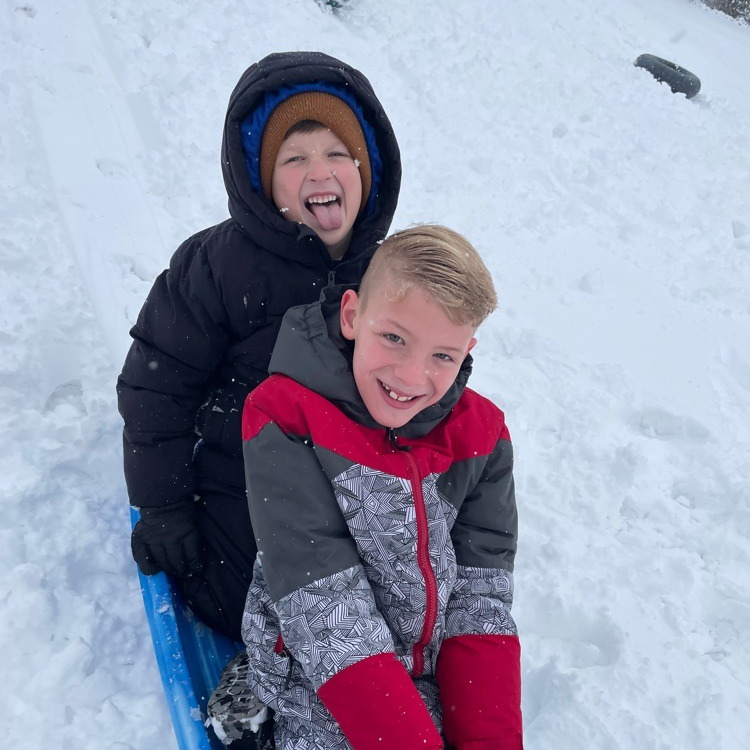 students sledding