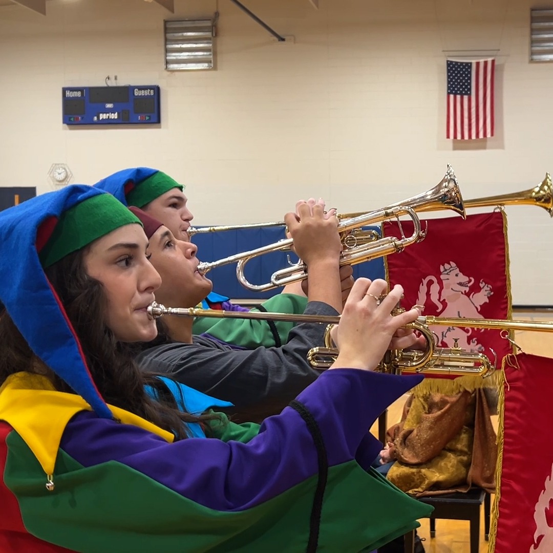 High School Madrigals visit 2-3 students