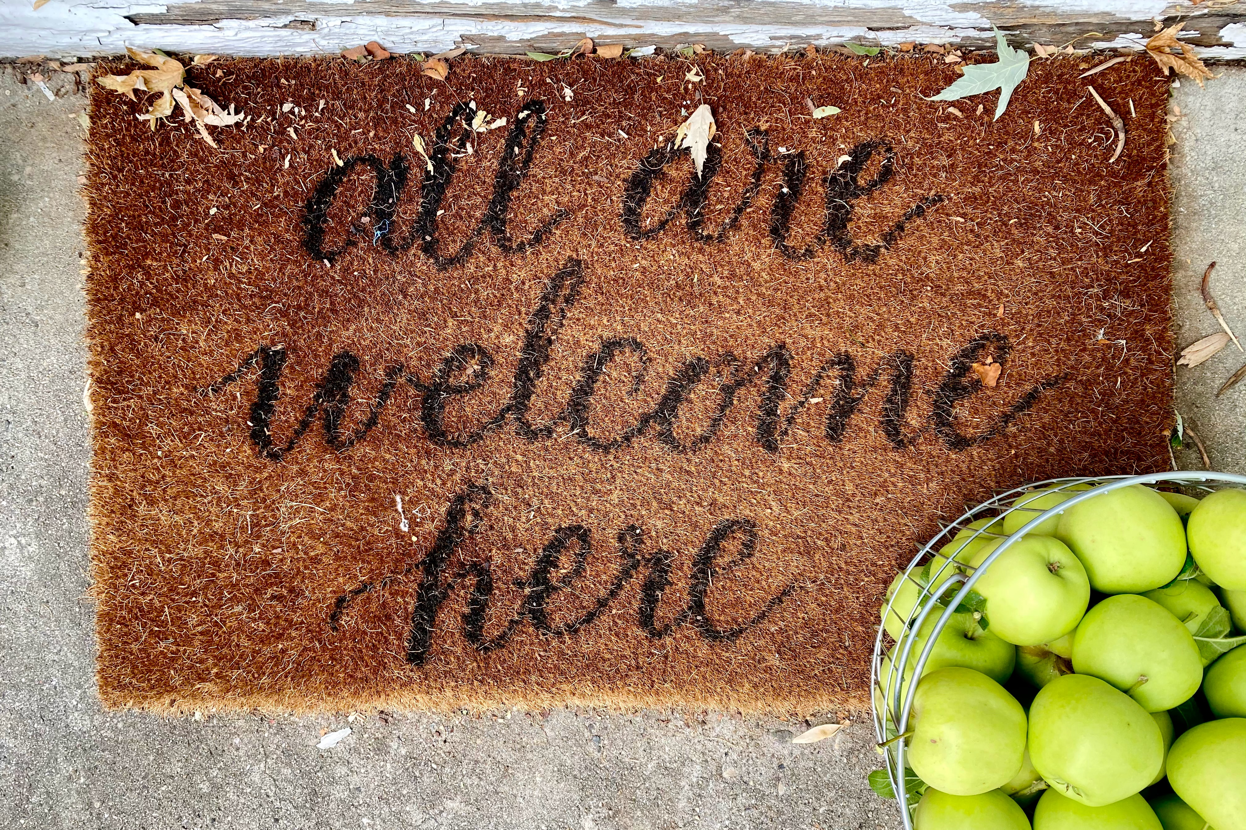 welcome mat with all are welcome here