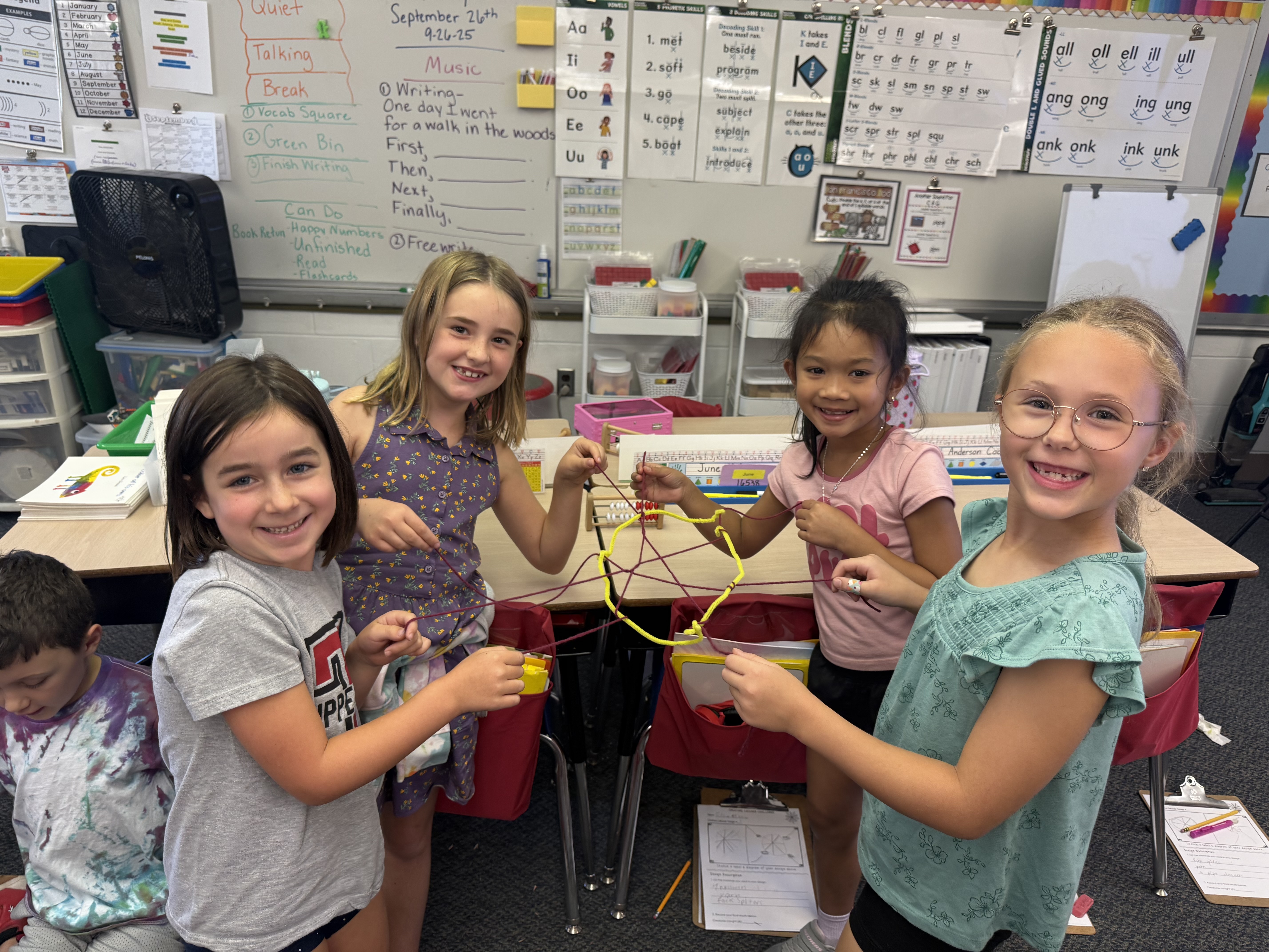 Students building a spider catcher.