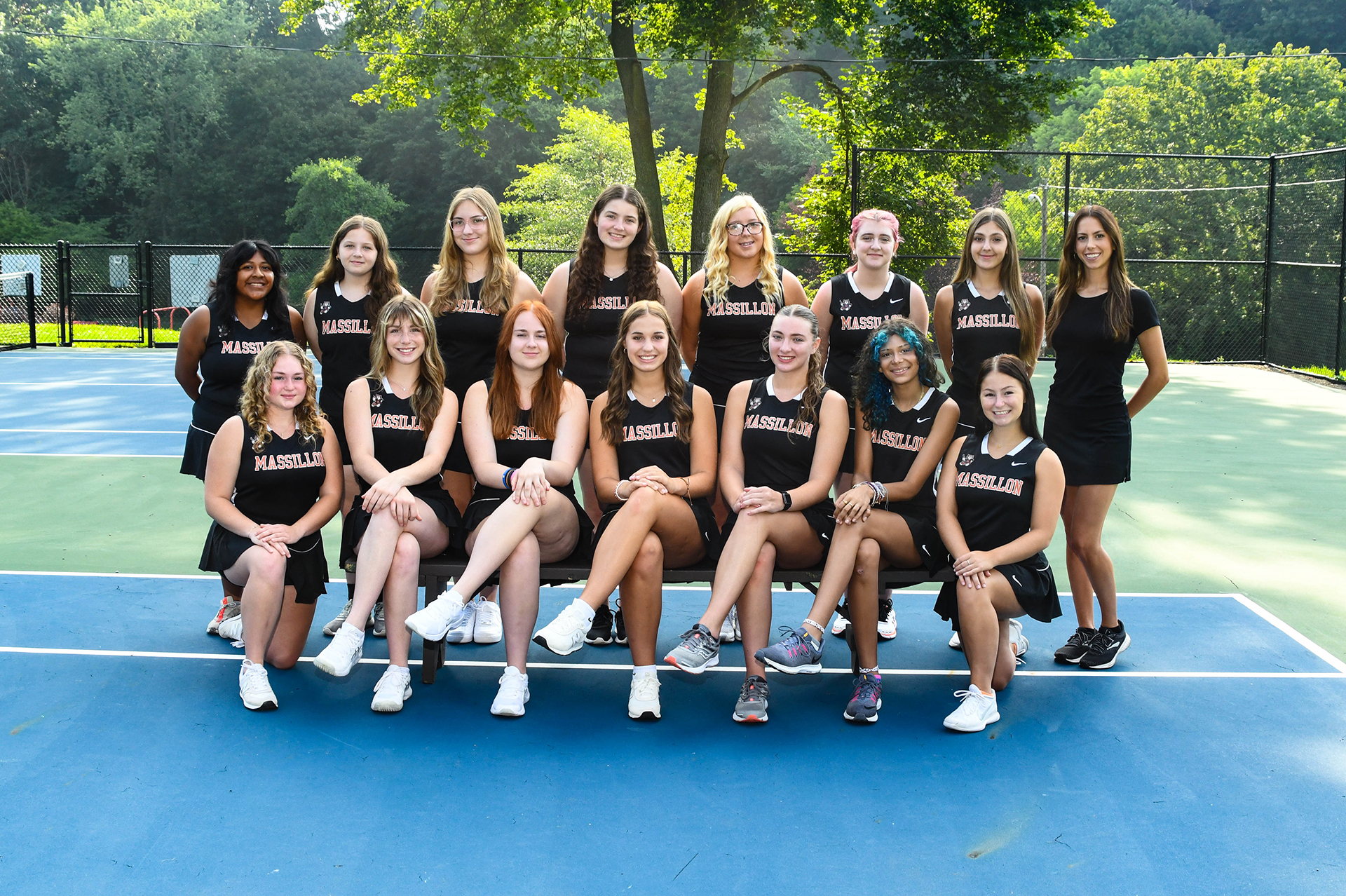 Girls tennis.  One player missing.