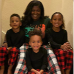 Ms. Boyd and her niece and nephews.