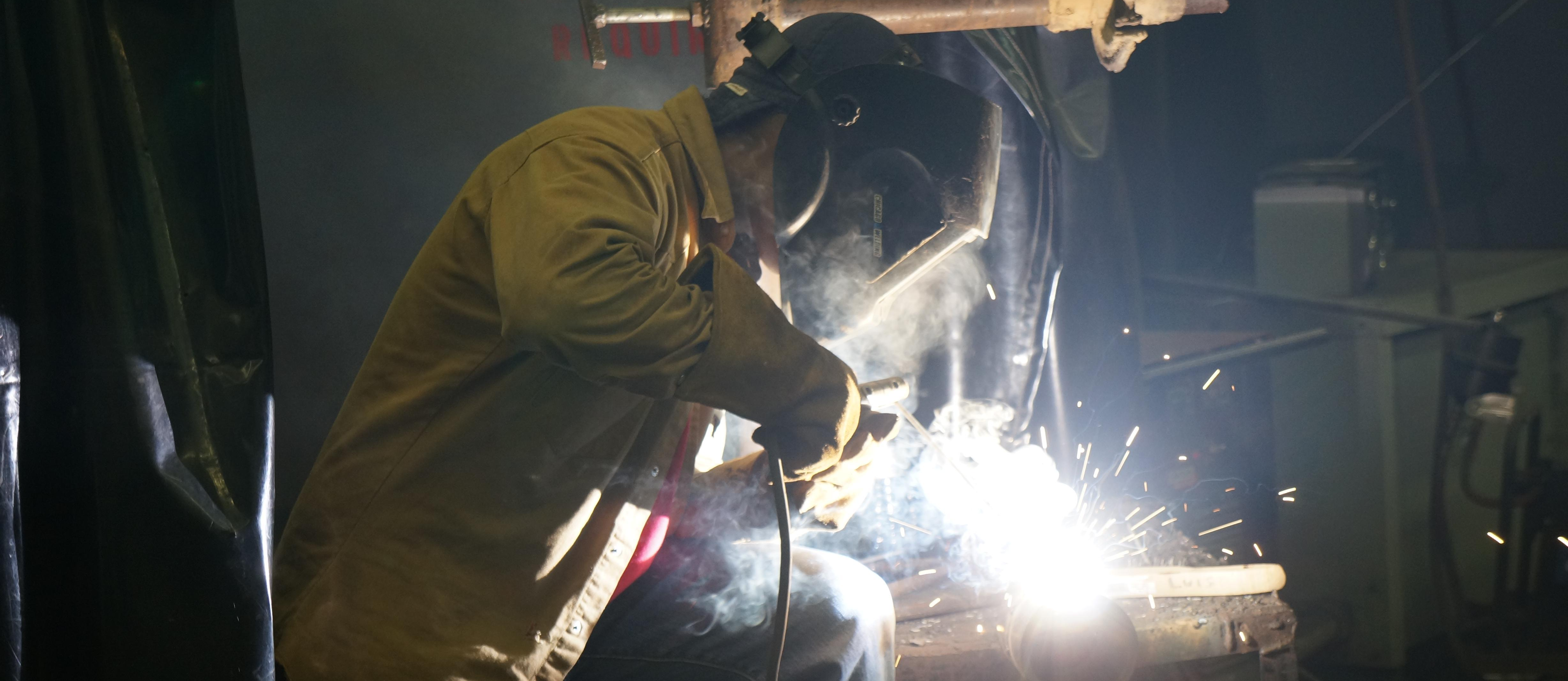 Student practices their welding