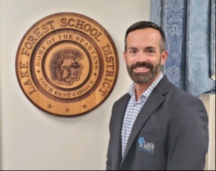 Board President, Mr. Jame L. Rau